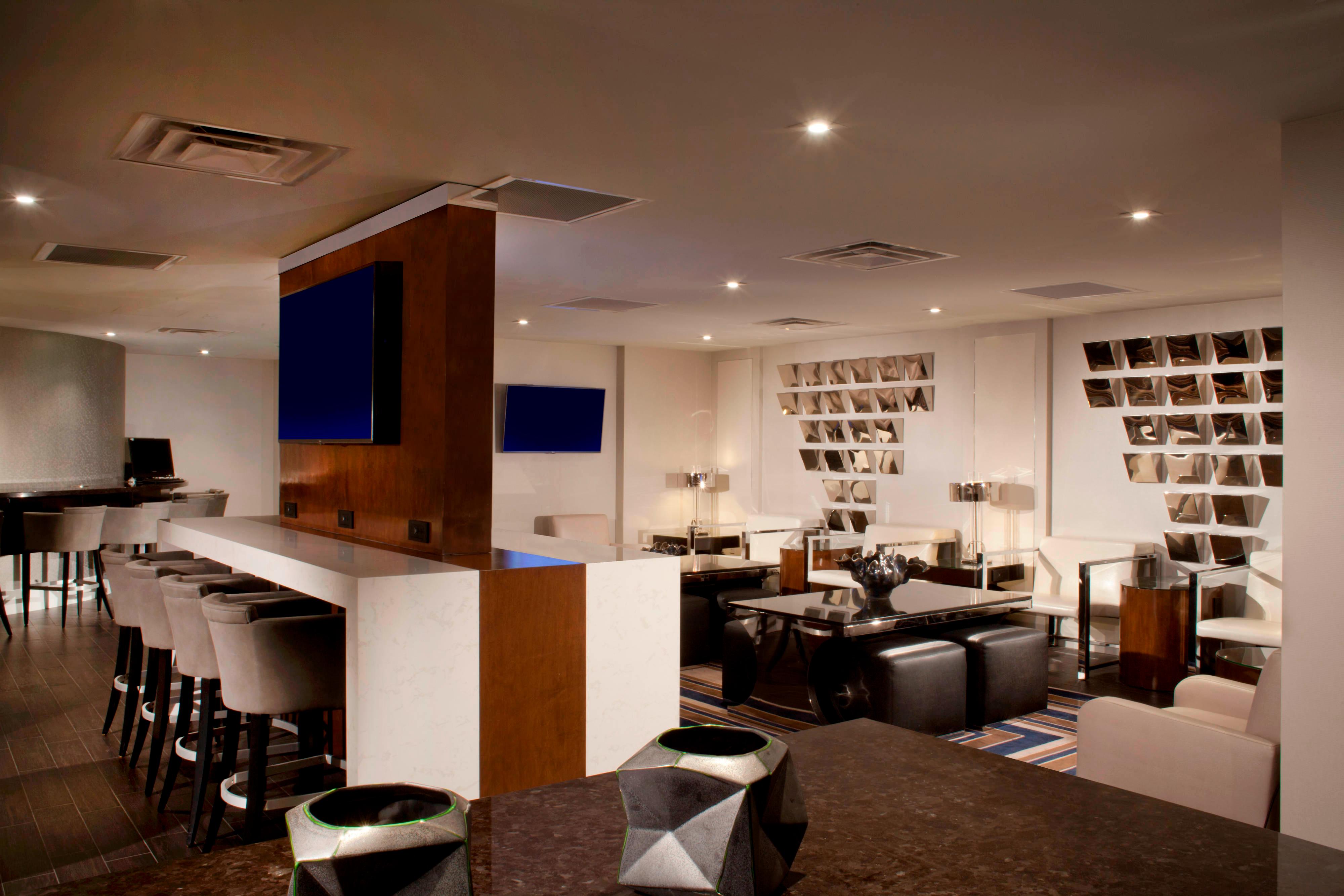 Executive lounge seating area with flatscreen television