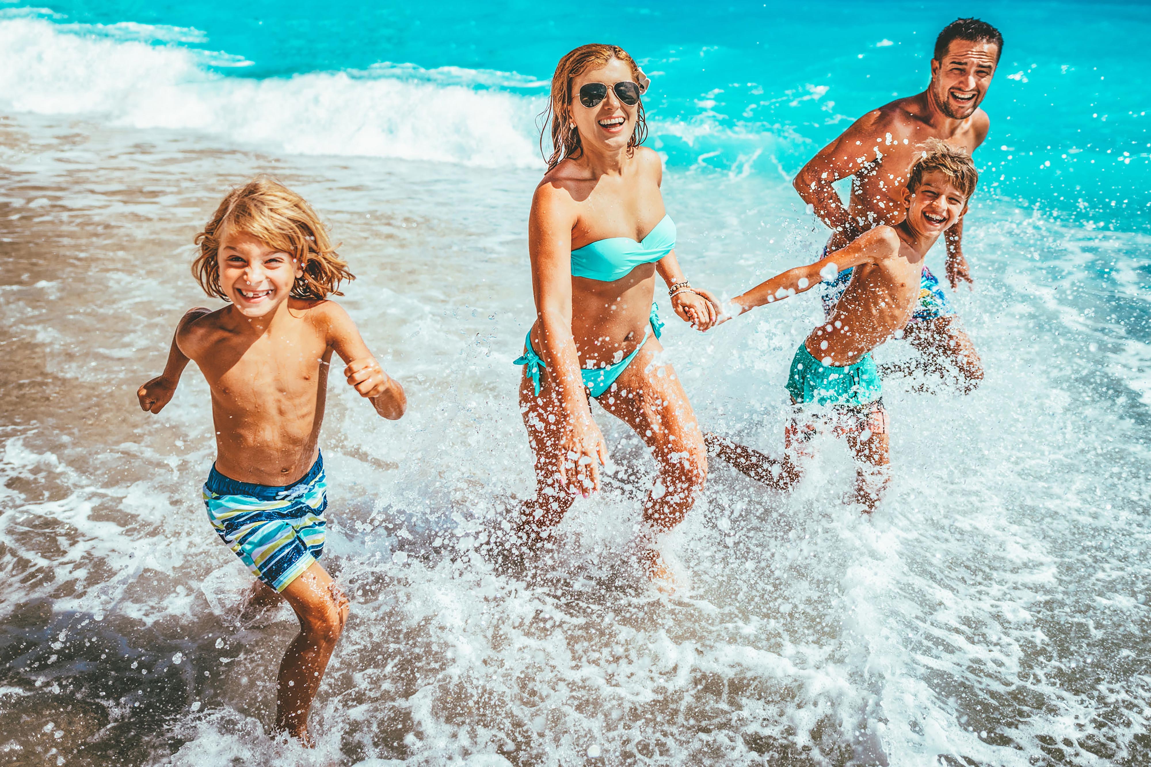 Family Playing on Beach