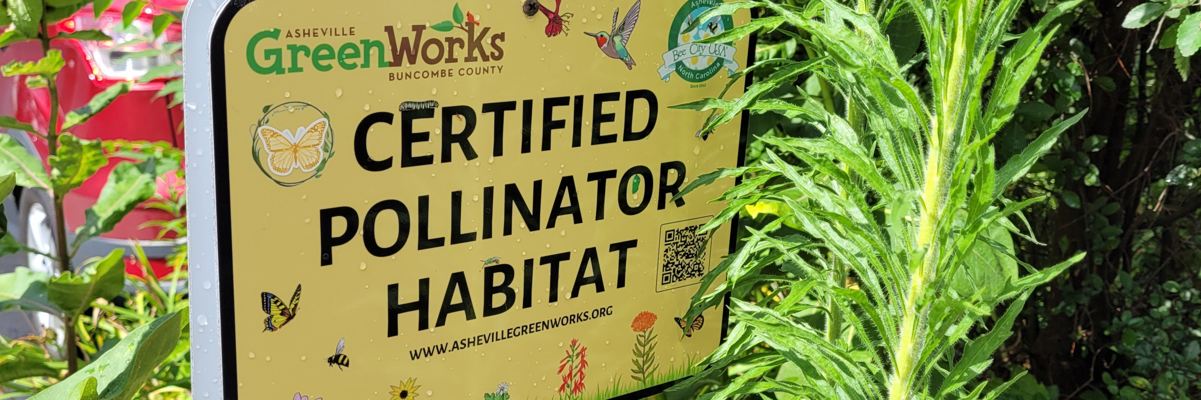 Garden sign that states certified pollinator habitat
