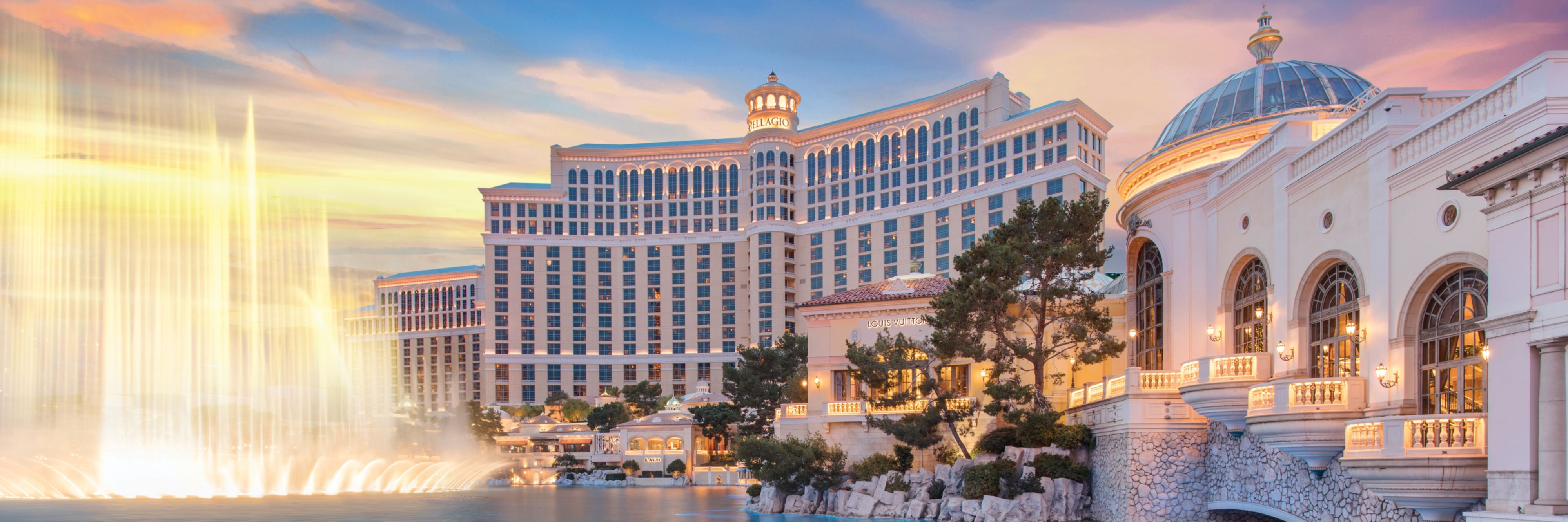 The Fountains of Bellagio in the reflection pool at golden hour.